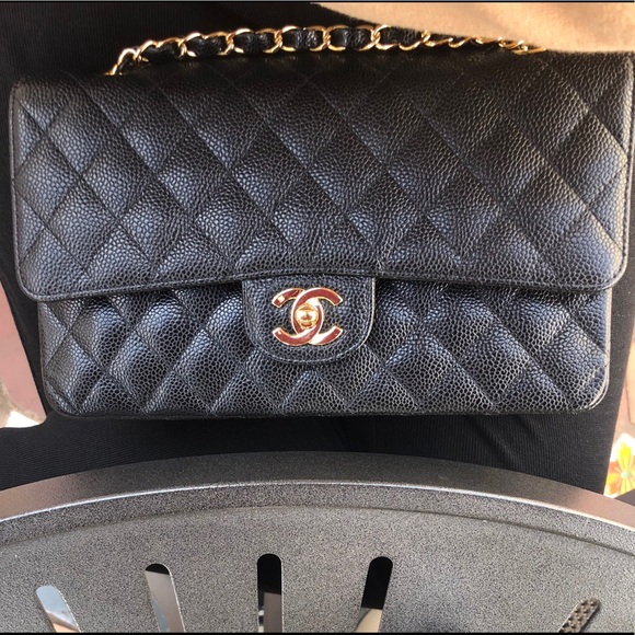 CHANEL Handbags - Chanel medium flap in black caviar leather